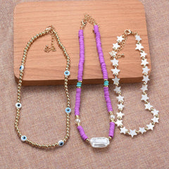 Wholesale Casual Ethnic Style Star Eye Alloy Soft Clay Beaded Pearl Plating Women's Necklace - ChicMeto