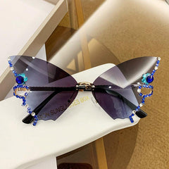 Wholesale Elegant Solid Color AC Butterfly Frame Diamond Frameless Women's Sunglasses - ChicMeto