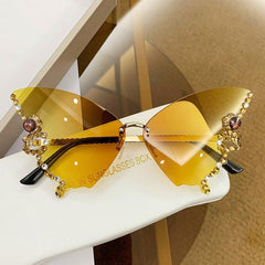 Wholesale Elegant Solid Color AC Butterfly Frame Diamond Frameless Women's Sunglasses - ChicMeto