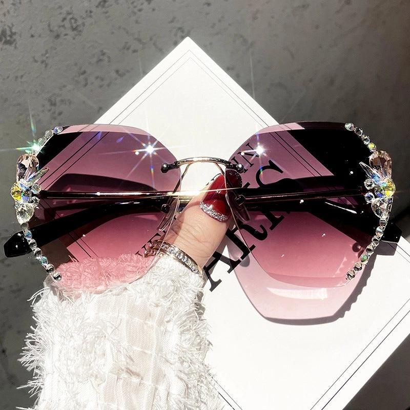 Wholesale Elegant Solid Color PC Oval Frame Rhinestone Frameless Women's Sunglasses - ChicMeto