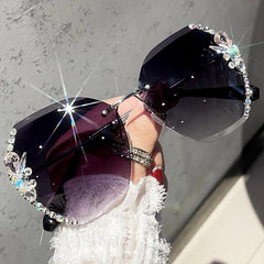 Wholesale Elegant Solid Color PC Oval Frame Rhinestone Frameless Women's Sunglasses - ChicMeto