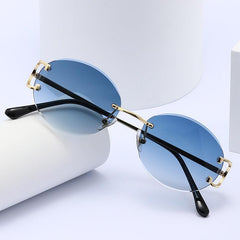 Wholesale Modern Style Streetwear Round PC Round Frame Frameless Women's Sunglasses - ChicMeto