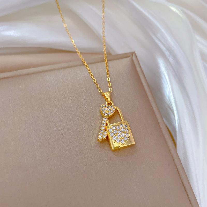 Wholesale Titanium Steel Casual Vacation Lock Inlay Artificial Diamond Pendant Necklace - ChicMeto