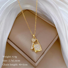 Wholesale Titanium Steel Casual Vacation Lock Inlay Artificial Diamond Pendant Necklace - ChicMeto