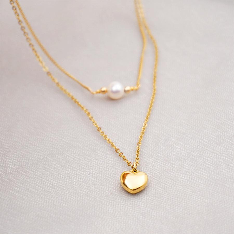 Wholesale Titanium Steel Gold Plated Simple Style Heart Shape Inlay Artificial Pearls Double Layer Necklaces Sweater Chain - ChicMeto