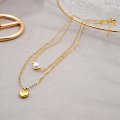 Wholesale Titanium Steel Gold Plated Simple Style Heart Shape Inlay Artificial Pearls Double Layer Necklaces Sweater Chain - ChicMeto