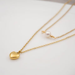 Wholesale Titanium Steel Gold Plated Simple Style Heart Shape Inlay Artificial Pearls Double Layer Necklaces Sweater Chain - ChicMeto